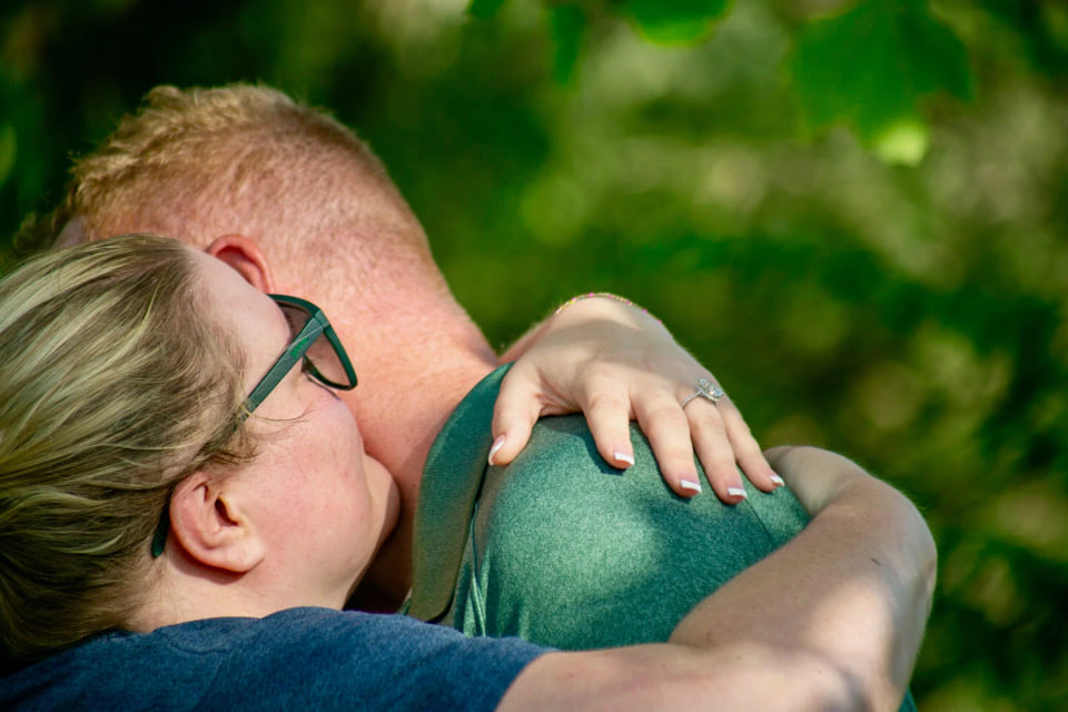 Luke and Lydia embracing after the proposal